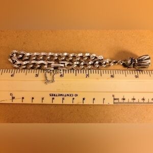 Charm SHP. EXCL silver tone bracelet with woman in chair charm